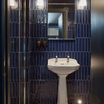Ensuite bathroom with blue tiles