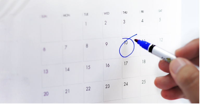 Highlighting a date on a calendar with a blue pen
