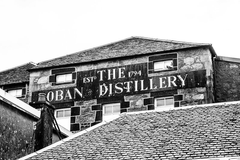 Black and white photograph of Oban Distillery